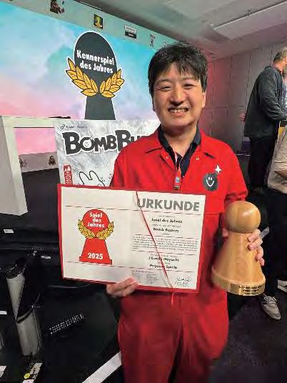 Hayashi Hisashi receiving the German Game of the Year award